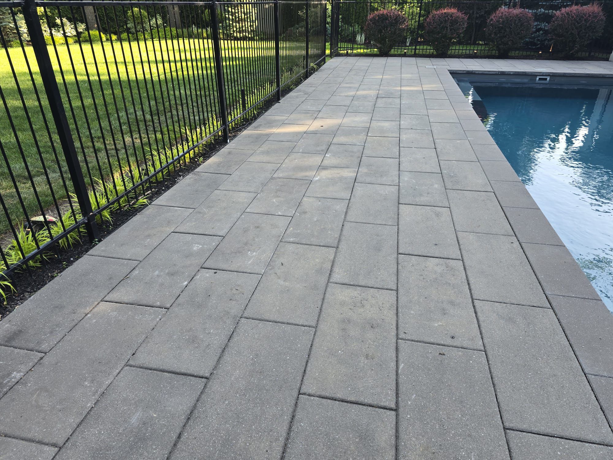 Natural stone pool deck and coping, Toronto luxury pool project